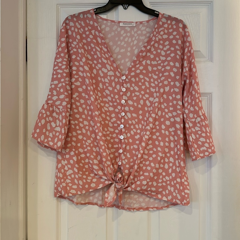 Cute pink and white flowy blouse that ties in the front